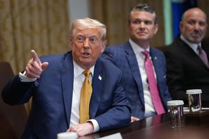 U.S. President Donald Trump (L) speaks during a Cabinet Meeting at the White House on July 8, 2025 in Washington, D.C. Trump discussed a wide range of topics during the portion of the meeting that was open to members of the media. Also pictured is Secretary of Defense Pete Hegseth (C) and Commerce Secretary Howard Lutnick (R). (Andrew Harnik/Getty Images/TCA)
