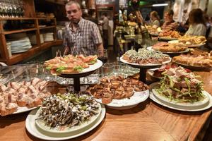 In cities like San Sebastián, bars offer plenty of pintxos– the Basque Country’s version of tapas. (Cameron Hewitt, Rick Steves’ Europe)