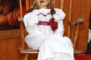 Bang Showbiz / Annabelle doll on display at Annabelle Comes Home premiere.