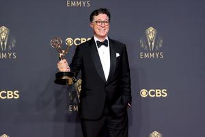 LOS ANGELES, CALIFORNIA - SEPTEMBER 19: Stephen Colbert, winner of the Outstanding Variety Special (Live) award for 'Stephen Colbert's Election Night 2020: Democracy's Last Stand Building Back America Great Again Better 2020,' poses in the press room during the 73rd Primetime Emmy Awards at L.A. LIVE on September 19, 2021 in Los Angeles, California. (Photo by Rich Fury/Getty Images)