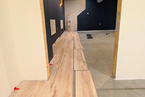 The staggered pieces of LVP will be snapped into position in less than 30 seconds per piece. If you can fog a mirror, you can install LVP. (Tim Carter/Tribune Content Agency). TNS