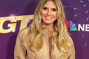 Bang Showbiz / Heidi Klum loves her work