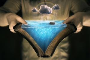 Reading the story of Noah`s ark. An open Bible with the story of Noah`s ark. Dreamstime/TCA
