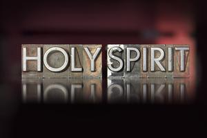 The words Holy Spirit written in vintage letterpress type. Dreamstime/TCA
