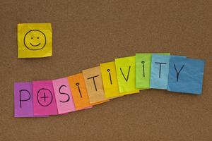 Positivity concept with smiley on cork board. Dreamstime/TCA