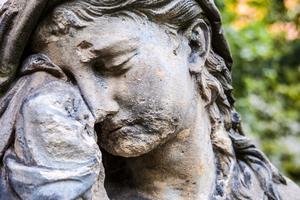 Detail of a mourning sculpture on a cemetery. Dreamstime/TCA