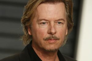 Bang Showbiz / David Spade considered pulling a gun on a group of professional autograph hunters who followed him back to his house after a comedy show