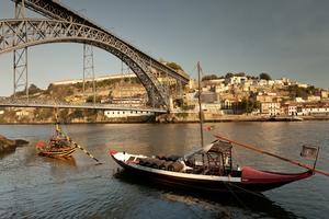 In Porto, flat-bottom boats called “rabelos” are a frequent sight along the Douro River. (Dominic Arizona Bonuccelli, Rick Steves’ Europe)