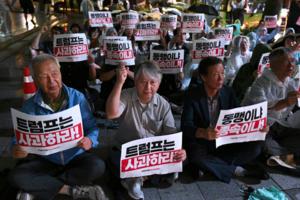 Jung Yeon-Je/AFP/Getty Images North America/TNS
