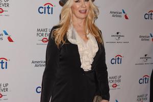 Bang Showbiz / Nancy Wilson says she and sister and Heart bandmate Ann 'took no prisoners' as females in the male-dominated music industry