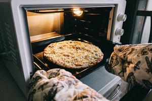 You can still look forward to pizza night. (Dreamstime/TCA)