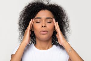 Woman calming herself down using self-control. Dreamstime/TCA