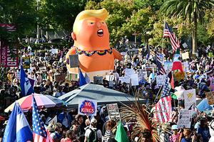 TOPSHOT - Protesters rally during the
