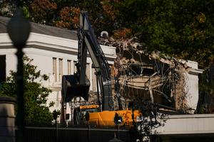 The facade of the East Wing of the White House is demolished by work crews on Oct. 21, 2025 in Washington, D.C. The demolition is part of U.S. President Donald Trump's plan to build a ballroom reportedly costing $250 million on the eastern side of the White House. (Andrew Harnik/Getty Images/TCA)