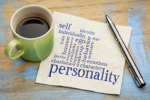 Personality and character word cloud - handwriting on a napkin with a cup of coffee. Dreamstime/TCA
