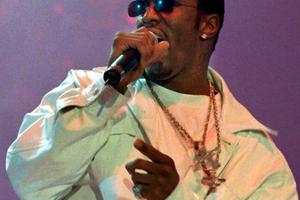 Bang Showbiz / Sean' Diddy' Combs has been photographed spending time with former NBA player Sebastian Telfair inside FCI Fort Dix.