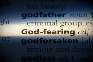 God-fearing in a dictionary. Dreamstime/TCA