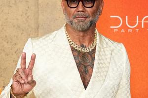 Bang Showbiz / Dave Bautista has called Henry Cavill 'a beast' for his work ethic while making Highlander