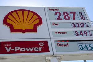 MIAMI, FLORIDA - OCTOBER 24: Gasoline price per gallon is displayed on a sign above a gas station on October 24, 2025, in Miami, Florida. According to the new Bureau of Labor Statistics data released on October 24, the 12-month inflation rate climbed to 3 percent in September, up from 2.9 percent in August, as gasoline prices rose by 4.1 percent, a major driver of inflation last month.  (Photo by Joe Raedle/Getty Images)