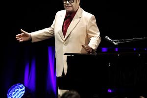 Bang Showbiz / Sir Elton John loves listening to his old albums