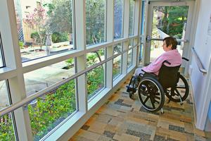 Woman in wheelchair. Dreamstime/TCA