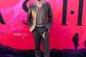 Bang Showbiz / Aaron Paul is loving his new life in Paris.