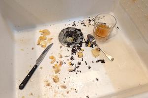 An inexpensive stainless steel kitchen strainer is in place to capture all of this food waste. Failure to do this can create clogs in kitchen drain pipes. (Tim Carter/Tribune Content Agency/TNS)