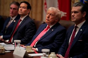 WASHINGTON, DC - DECEMBER 02: U.S. President Donald Trump attends a meeting of his Cabinet alongside (L-R) U.S. Interior Secretary Doug Burgum, U.S. Secretary of State Marco Rubio and U.S. Secretary of War Pete Hegseth in the Cabinet Room of the White House on December 02, 2025 in Washington, DC. A bipartisan Congressional investigation has begun regarding Secretary of War Pete Hegseth's role in ordering U.S. military strikes on small boats in the waters off Venezuela that have killed scores of people, which Hegseth said are intended 