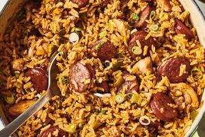 This one-pot dish is packed with rich, deep flavors, and stars smoky andouille sausage and juicy chicken thighs. (Joe Lingeman/TCA)
