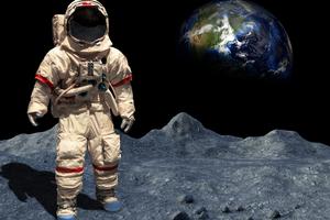 An astronaut walk or walks on the lunar surface during a moon landing. Dreamstime/TCA