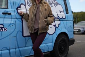 Bang Showbiz / Bonnie Blue next to her Bang Bus