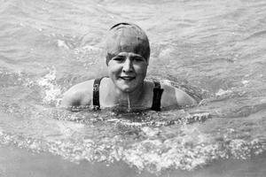 American Olympic gold medalist, swimmer Gertrude Ederle (1905 - 2003) poses in the sea at Brighton, training for her cross English Channel swim, July 2, 1925. (Photo by Topical Press Agency/Getty Images)