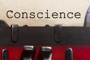 Conscience typed on an old vintage paper with odd typewriter font. Dreamstime