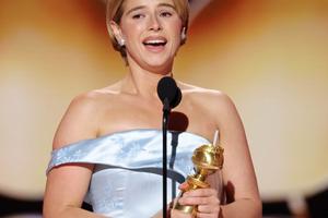 Bang Showbiz / Jessie Buckley with her Golden Globe award.