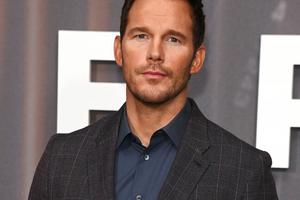 Bang Showbiz / Chris Pratt has a giant painting of Arnold Schwarzenegger dressed as Santa