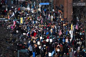MINNEAPOLIS, MINNESOTA - JANUARY 24: People gather at the intersection of 26th Street and Nicollet Avenue after a fatal shooting by federal agents on January 24, 2026 in Minneapolis, Minnesota. Federal agents allegedly shot and killed 37-year-old Alex Pretti, a south Minneapolis resident, amid a scuffle to arrest him. The Trump administration has sent a reported 3,000 federal agents into the area, with more on the way, as they make a push to arrest undocumented immigrants in the region. (Photo by Stephen Maturen/Getty Images)