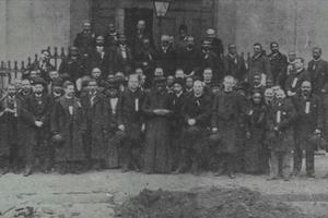 Attendees at the 1892 Colored Catholic Congress included the nation's first openly Black priest, Augustus Tolton, who stands in the middle of the front row. Wikimedia Commons