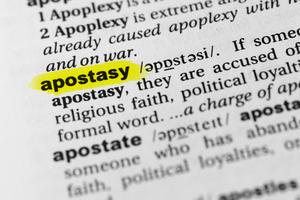 Highlighted English word ‘apostasy’ and its definition in the dictionary. Dreamstime/TCA