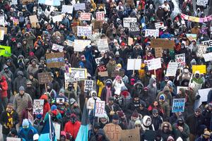 MINNEAPOLIS, MINNESOTA - JANUARY 25: Demonstrators march through downtown protesting ICE operations and the death of Renee Good and Alex Pretti on January 25, 2026 in Minneapolis, Minnesota. Pretti, an ICU nurse at a VA medical center, died yesterday after being shot multiple times during a brief altercation with border patrol agents in the Eat Street district of Minneapolis. Good was killed by an ICE agent on January 7. (Photo by Scott Olson/Getty Images)