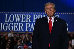 President Donald Trump arrives to deliver remarks on the economy in Clive, Iowa, on Jan. 27, 2026. (Brendan Smialowski/AFP via Getty Images/TCA)