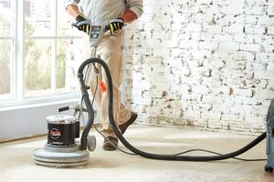 Make sure the floor is cleaned and sanded. (Lowe’s/TCA)