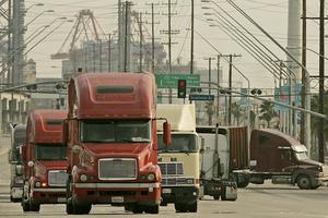 Trucks leave a smoggy Port of Long Beach in 2008, the year before the endangerment finding was released. Luis Sinco/Los Angeles Times via Getty Images