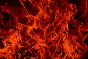 Red Fire Flames of Hell against a black background. Dreamstime/TCA