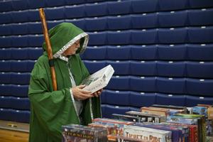 David Cargo, a Dungeons & Dragons player, dressed as one of his characters named Thorn Woodson, browses through board games at Portland Comic Expo on Oct. 27, 2019, in Portland, Ore.  Ariana van den Akker/Portland Press Herald via Getty Images