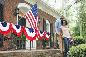 Homeownership, often considered key to the American Dream, is difficult to achieve for many families due to rising housing costs. Kingfisher Productions via Getty Images