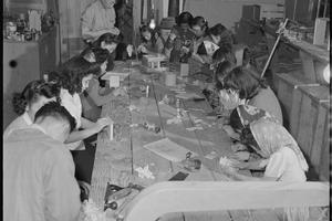 Japanese Americans incarcerated at Heart Mountain concentration camp in Wyoming took art classes at the craft shop, using what they could find. Tom Parker, War Relocation Authority, Department of the Interior, via National Archives and Records Administration