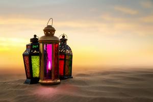 Arabic Ramadan lantern on desert dunes. Dreamstime/TCA