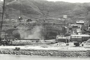 Greenland's cryolite mine, essential for U.S. airplane production, was below sea level and vulnerable to Nazi sabotage. Reginald Wilcox, ca. 1941. Peary–MacMillan Arctic Museum, Bowdoin College
