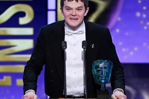 Bang Showbiz / Robert Aramayo accepting the EE BAFTA Rising Star Award at the 2026 EE BAFTA Film Awards