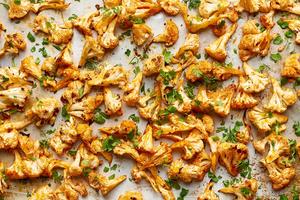 Crispy, spicy cauliflower bites are great eaten as is or stuffed into a taco. (Joe Lingeman/TCA)